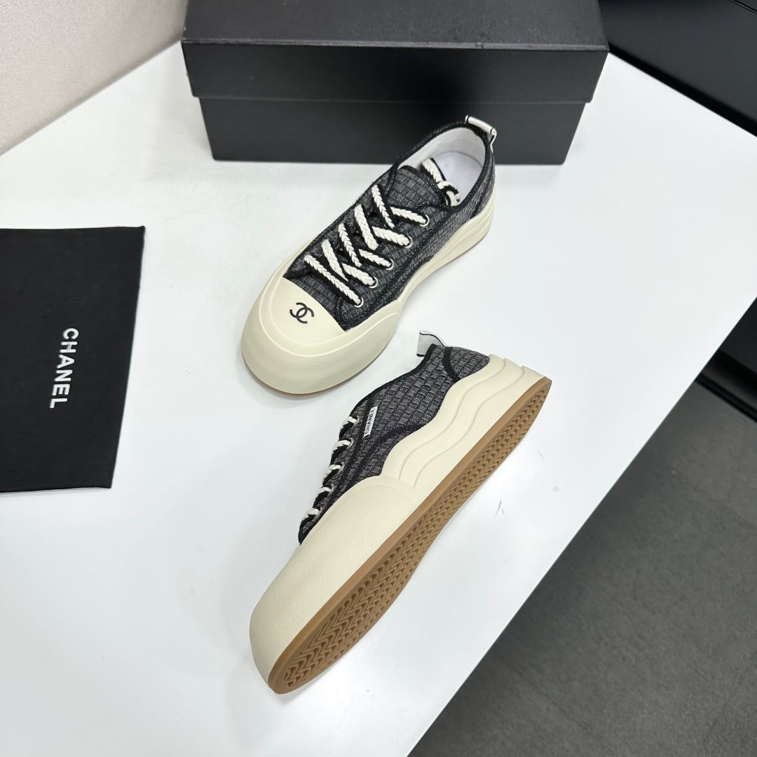 CHANEL 26S PLATFORM SNEAKERS IN BLACK CHECKERED WOVEN FABRIC
