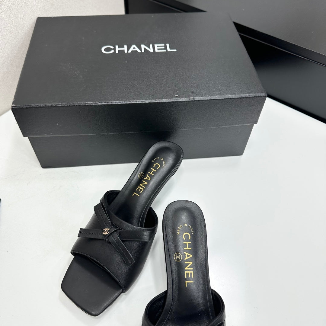 CHANEL 26S HIGH HEEL MULE SANDALS 50 MM IN BLACK LAMBSKIN WITH BOW DETAIL