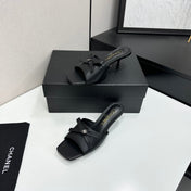 CHANEL 26S HIGH HEEL MULE SANDALS 50 MM IN BLACK LAMBSKIN WITH BOW DETAIL