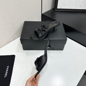 CHANEL 26S HIGH HEEL MULE SANDALS 50 MM IN BLACK LAMBSKIN WITH BOW DETAIL