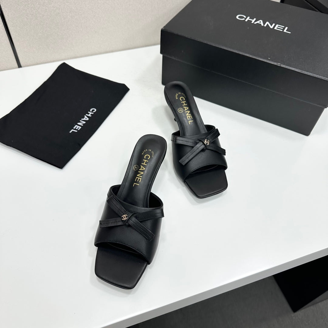 CHANEL 26S HIGH HEEL MULE SANDALS 50 MM IN BLACK LAMBSKIN WITH BOW DETAIL