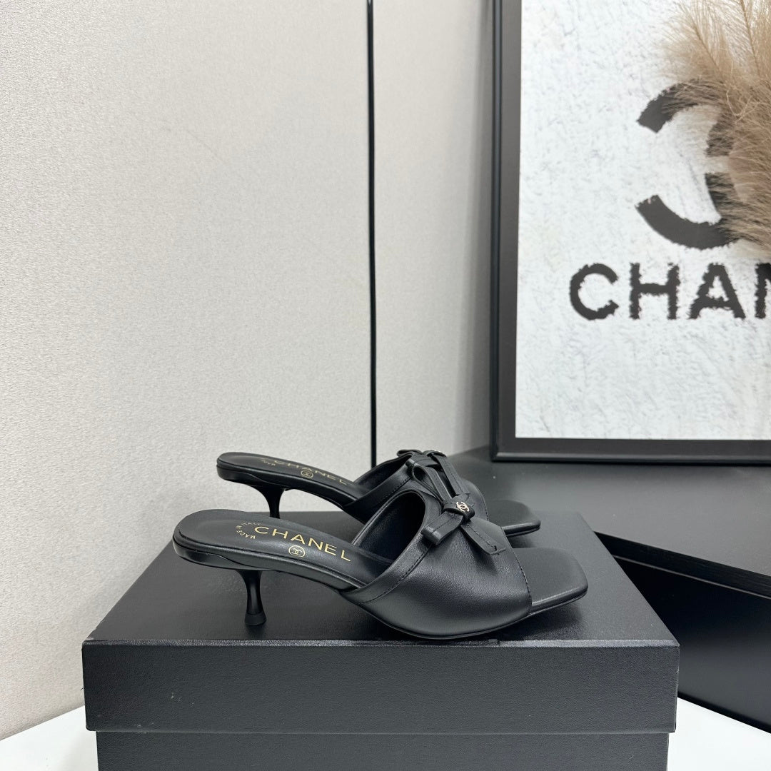 CHANEL 26S HIGH HEEL MULE SANDALS 50 MM IN BLACK LAMBSKIN WITH BOW DETAIL