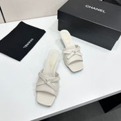 CHANEL 26S HIGH HEEL MULE SANDALS 50 MM IN WHITE LAMBSKIN WITH BOW DETAIL