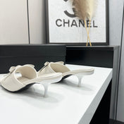 CHANEL 26S HIGH HEEL MULE SANDALS 50 MM IN WHITE LAMBSKIN WITH BOW DETAIL