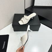 CHANEL 26S HIGH HEEL MULE SANDALS 50 MM IN WHITE LAMBSKIN WITH BOW DETAIL