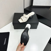 CHANEL 26S HIGH HEEL MULE SANDALS 50 MM IN WHITE LAMBSKIN WITH BOW DETAIL
