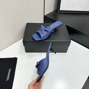 CHANEL 26S HIGH HEEL MULE SANDALS 50 MM IN BLUE LAMBSKIN WITH BOW DETAIL