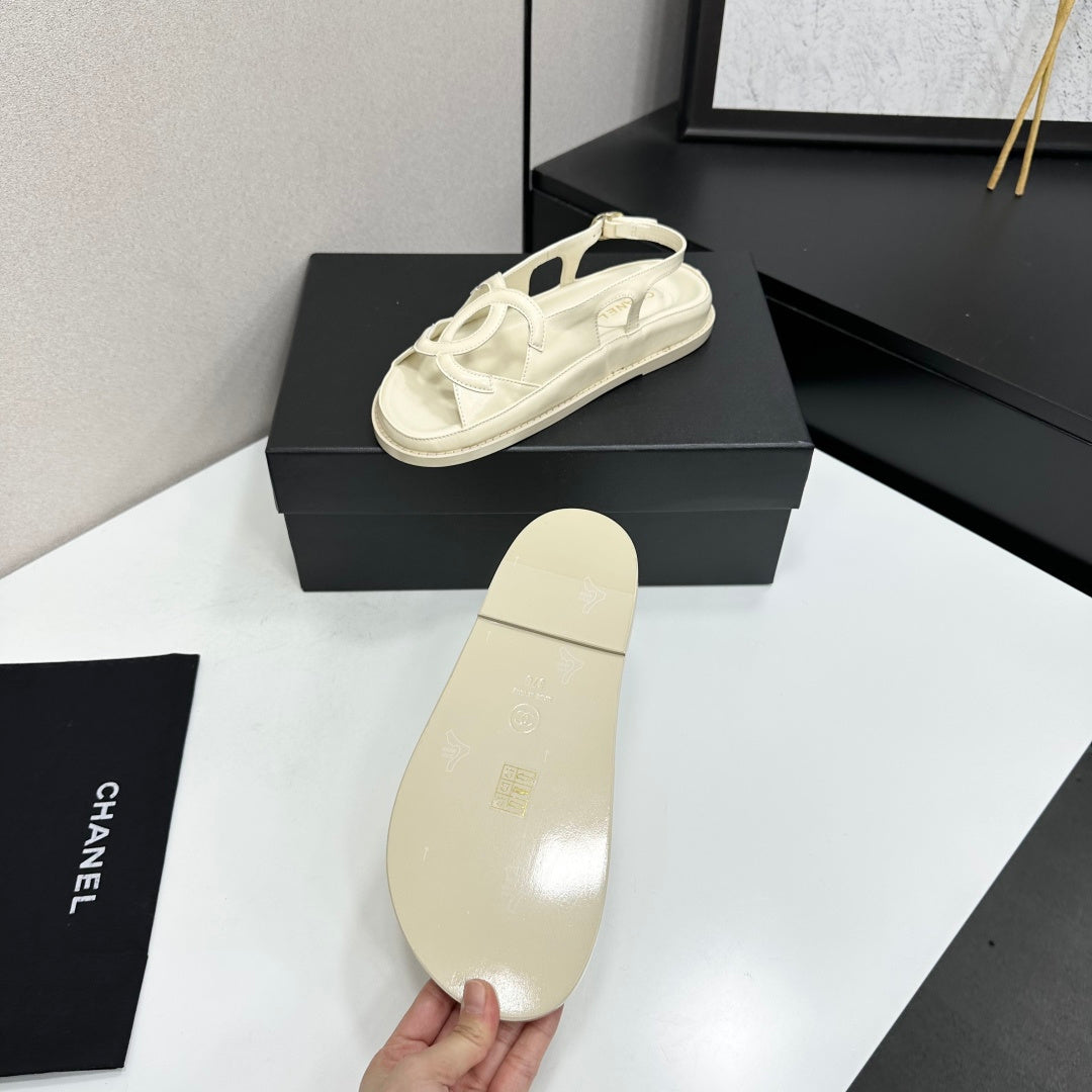 CHANEL 26S FLAT SANDALS IN CREAM WHITE LAMBSKIN