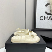 CHANEL 26S FLAT SANDALS IN CREAM WHITE LAMBSKIN
