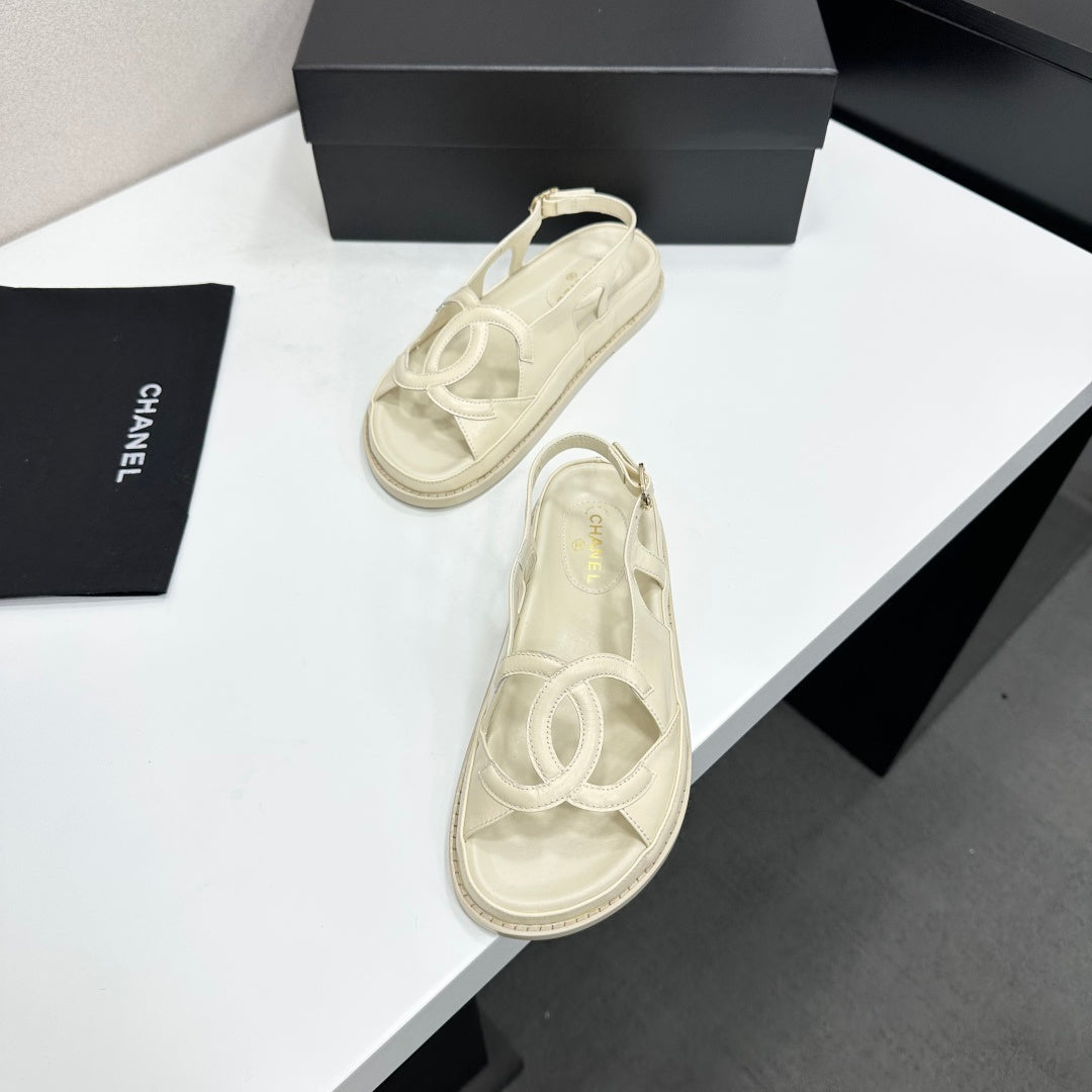 CHANEL 26S FLAT SANDALS IN CREAM WHITE LAMBSKIN