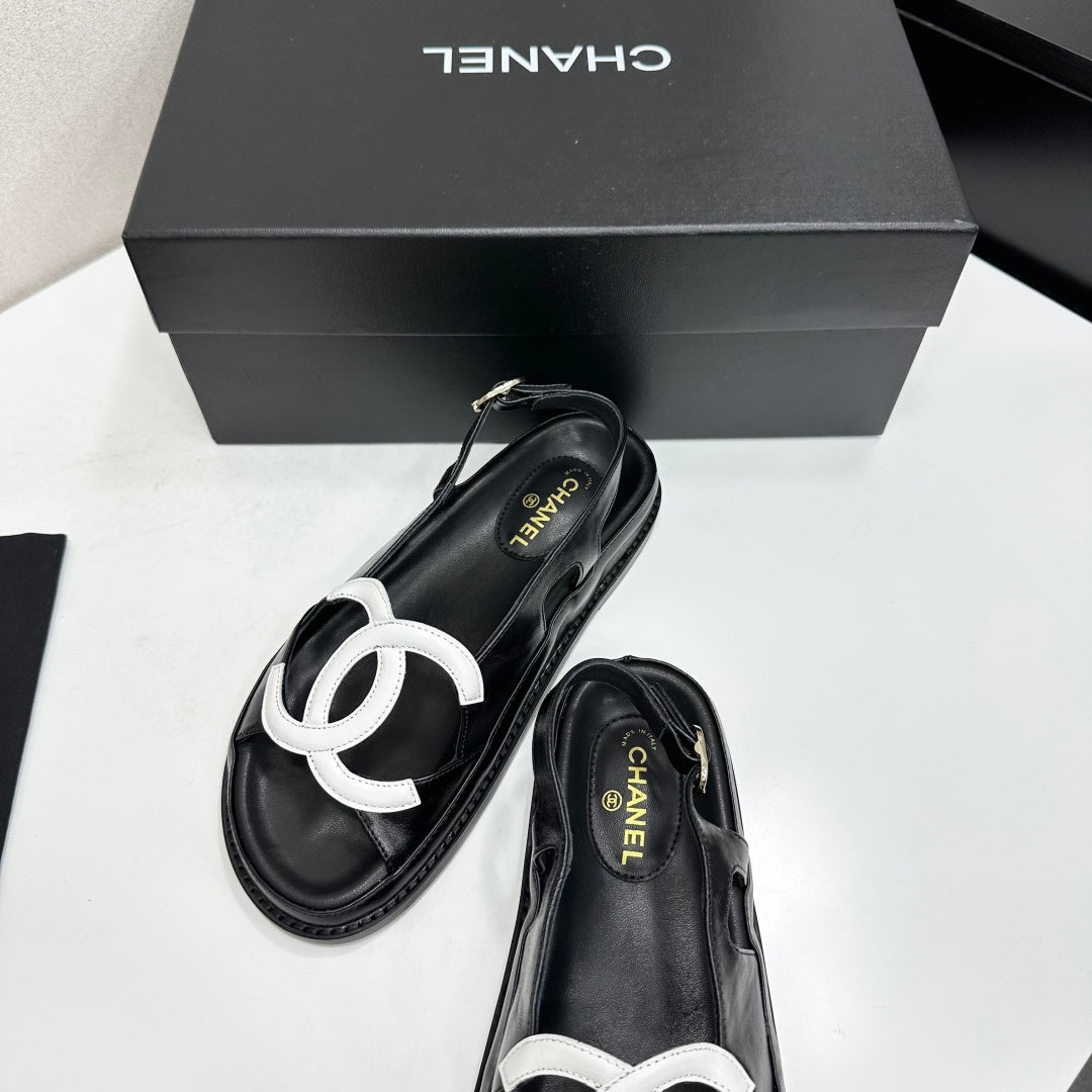 CHANEL 26S FLAT SANDALS IN BLACK LAMBSKIN WITH WHITE OVERSIZED CC LOGO