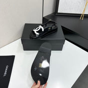 CHANEL 26S FLAT SANDALS IN BLACK LAMBSKIN WITH WHITE OVERSIZED CC LOGO