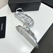 CHANEL 26S FLAT SANDALS IN SILVER LAMBSKIN