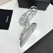 CHANEL 26S FLAT SANDALS IN SILVER LAMBSKIN