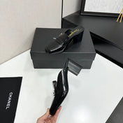 CHANEL 26S MULE PUMPS IN BLACK PATENT CALFSKIN
