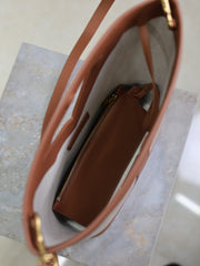 YSL 25S Y SMALL BUCKET 29 IN DESERT DUST AND BRICK CANVAS GOLD HARDWARE