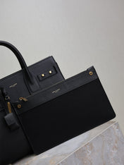 YSL 25S SAC DE JOUR GM 32 IN BLACK SUPPLE GRAINED CALFSKIN GOLD HARDWRE