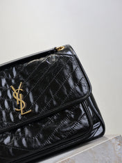 YSL 25S NIKI GM BAG 32 IN BLACK GLOSSY CALFSKIN GOLD HARDWARE