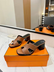 HM 26S HELIA SANDAL 70MM IN BROWN AND BLACK CALFSKIN