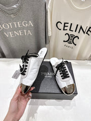 PRADA 25S MULES IN WHITE WITH METAL TOECAP