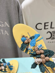AQUAZZURA 26S FLORAL APPLIQUE THONG SANDALS IN YELLOW CALFSKIN