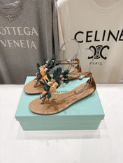 AQUAZZURA 26S FLORAL APPLIQUE THONG SANDALS IN BROWN CALFSKIN
