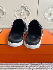 HM 25S MULES IN BLACK LAMBSKIN WITH SILVER HARDWARE