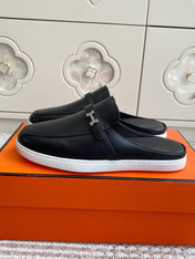 HM 25S MULES IN BLACK LAMBSKIN WITH SILVER HARDWARE