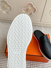 HM 25S MULES IN BLACK LAMBSKIN WITH SILVER HARDWARE