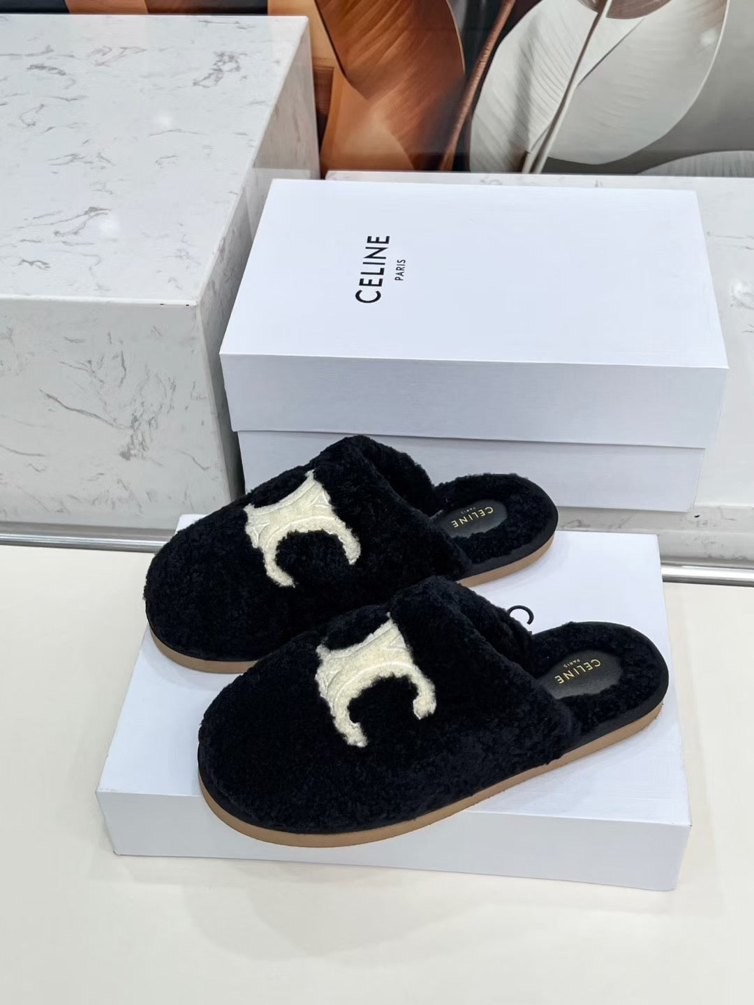 CELINE 25S GEORGIA SLIDE IN SHEARLING IN BLACK