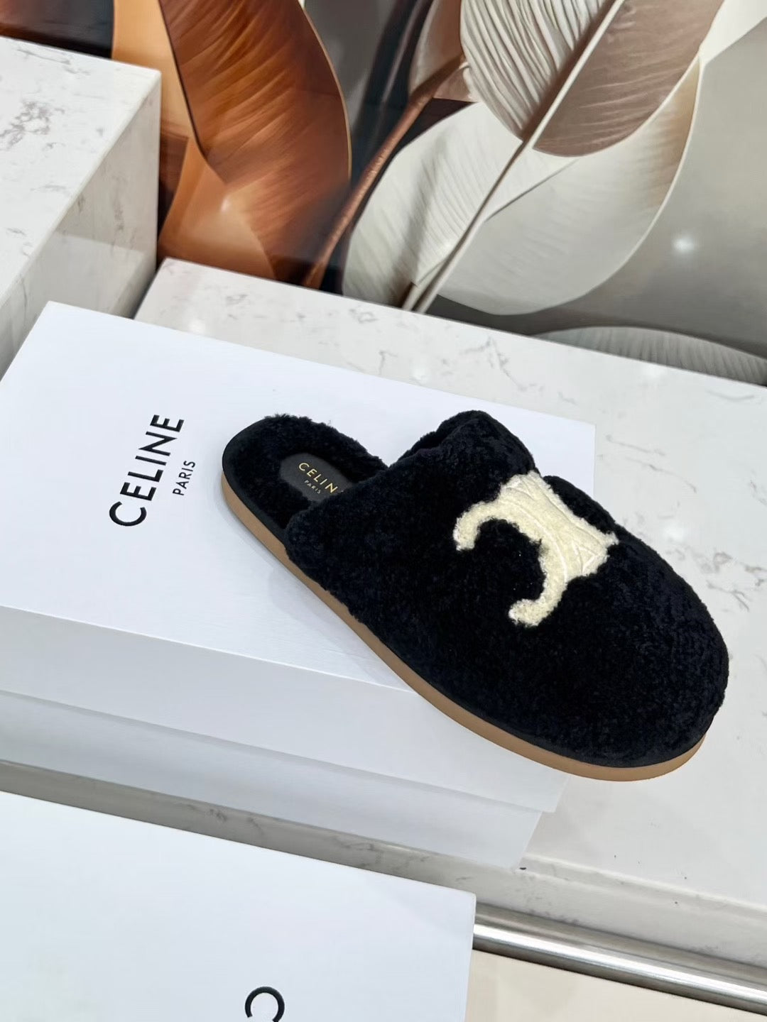 CELINE 25S GEORGIA SLIDE IN SHEARLING IN BLACK