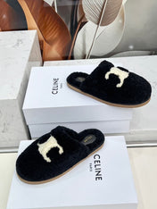 CELINE 25S GEORGIA SLIDE IN SHEARLING IN BLACK