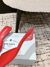 PRADA 25S POINTED-TOE MULES IN CRIMSON RED SATIN