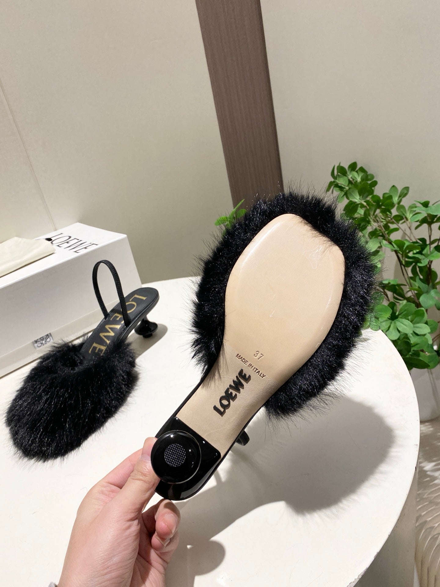 LOEWE 26S OPEN-BACK HIGH HEELS 60MM IN BLACK CALFSKIN WITH FUR