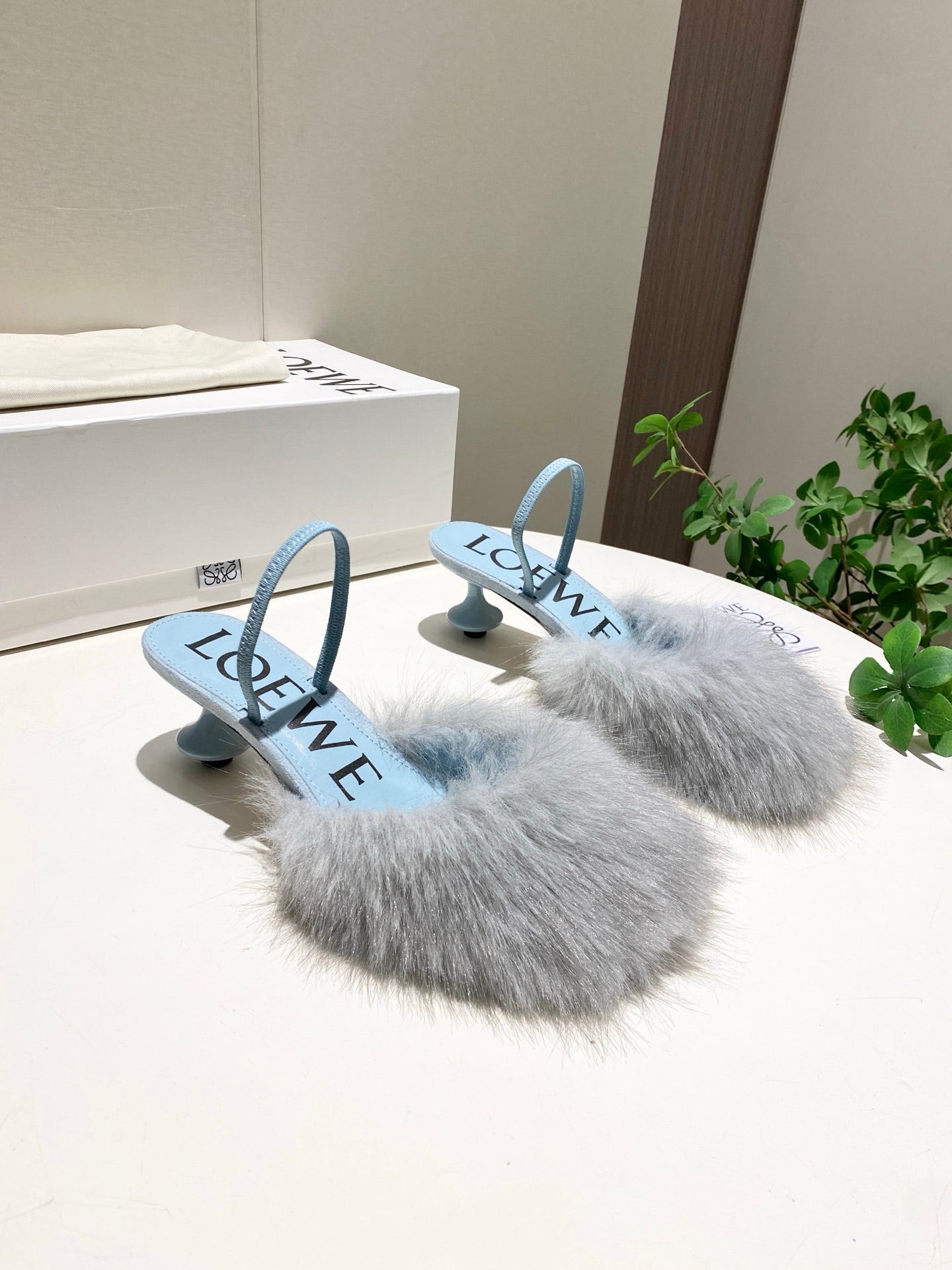LOEWE 26S OPEN-BACK HIGH HEELS 60MM IN LIGHT BLUE CALFSKIN WITH FUR