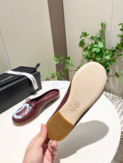 CHANEL 26S FLAT MULES IN DARK RED LAMBSKIN