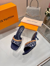 LV 26S HIGH-HEELED MULES 55 MM IN DARK BLUE AND WHITE EMBROIDERED MONOGRAM CANVAS