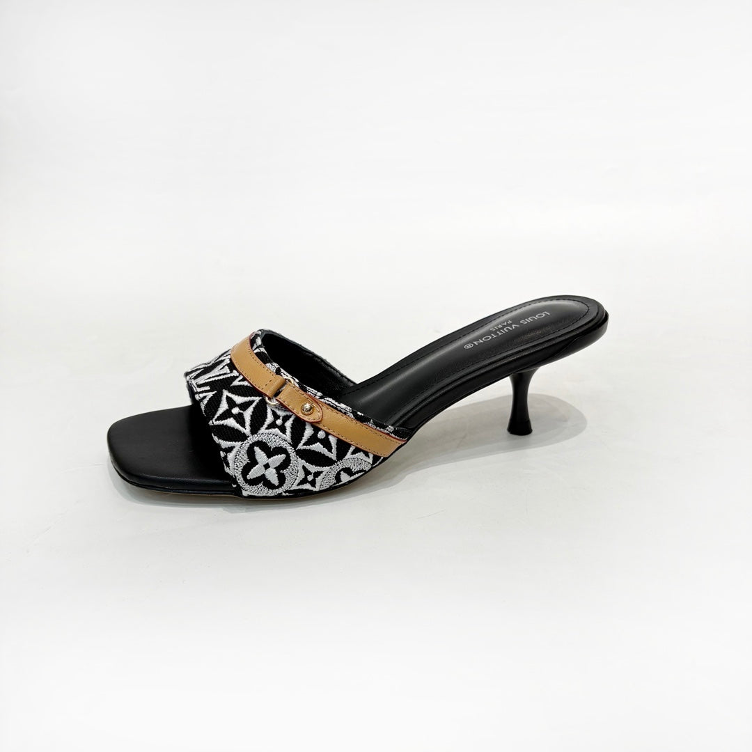 LV 26S HIGH-HEELED MULES 55 MM IN BLACK AND WHITE EMBROIDERED MONOGRAM CANVAS