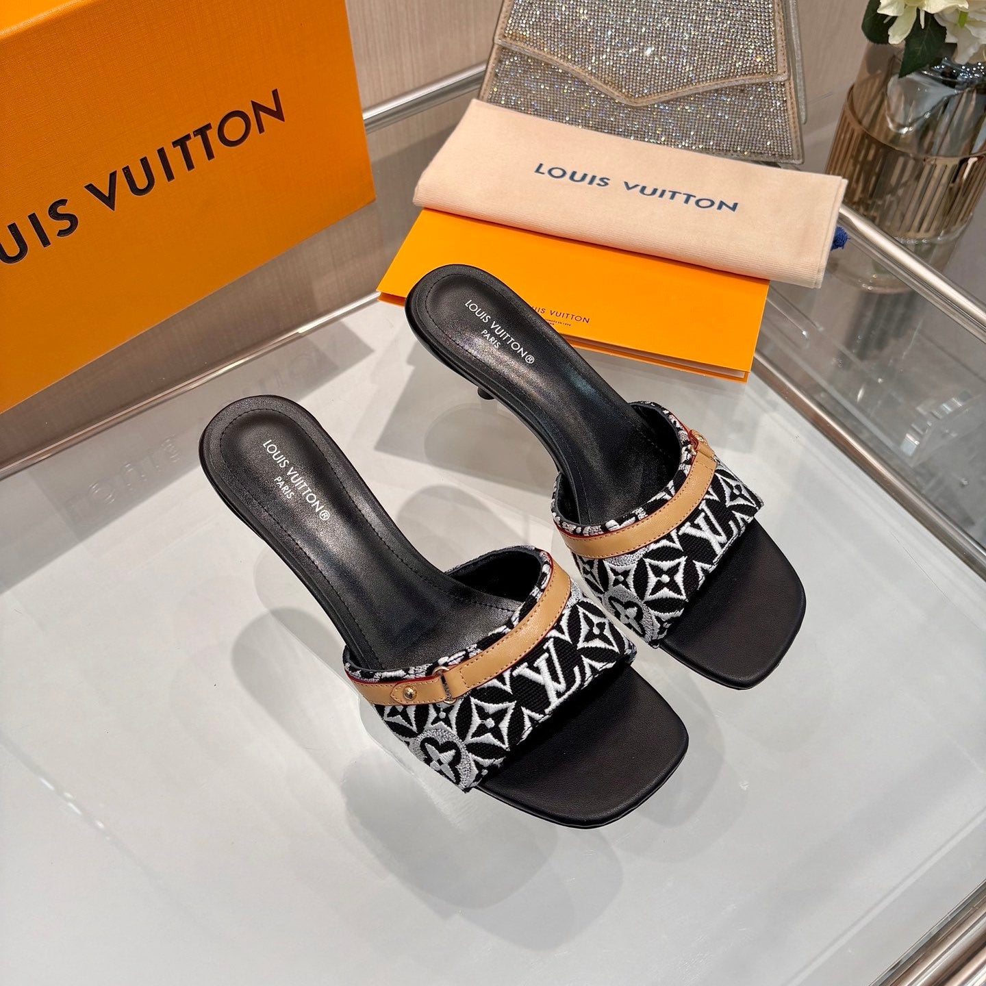 LV 26S HIGH-HEELED MULES 55 MM IN BLACK AND WHITE EMBROIDERED MONOGRAM CANVAS