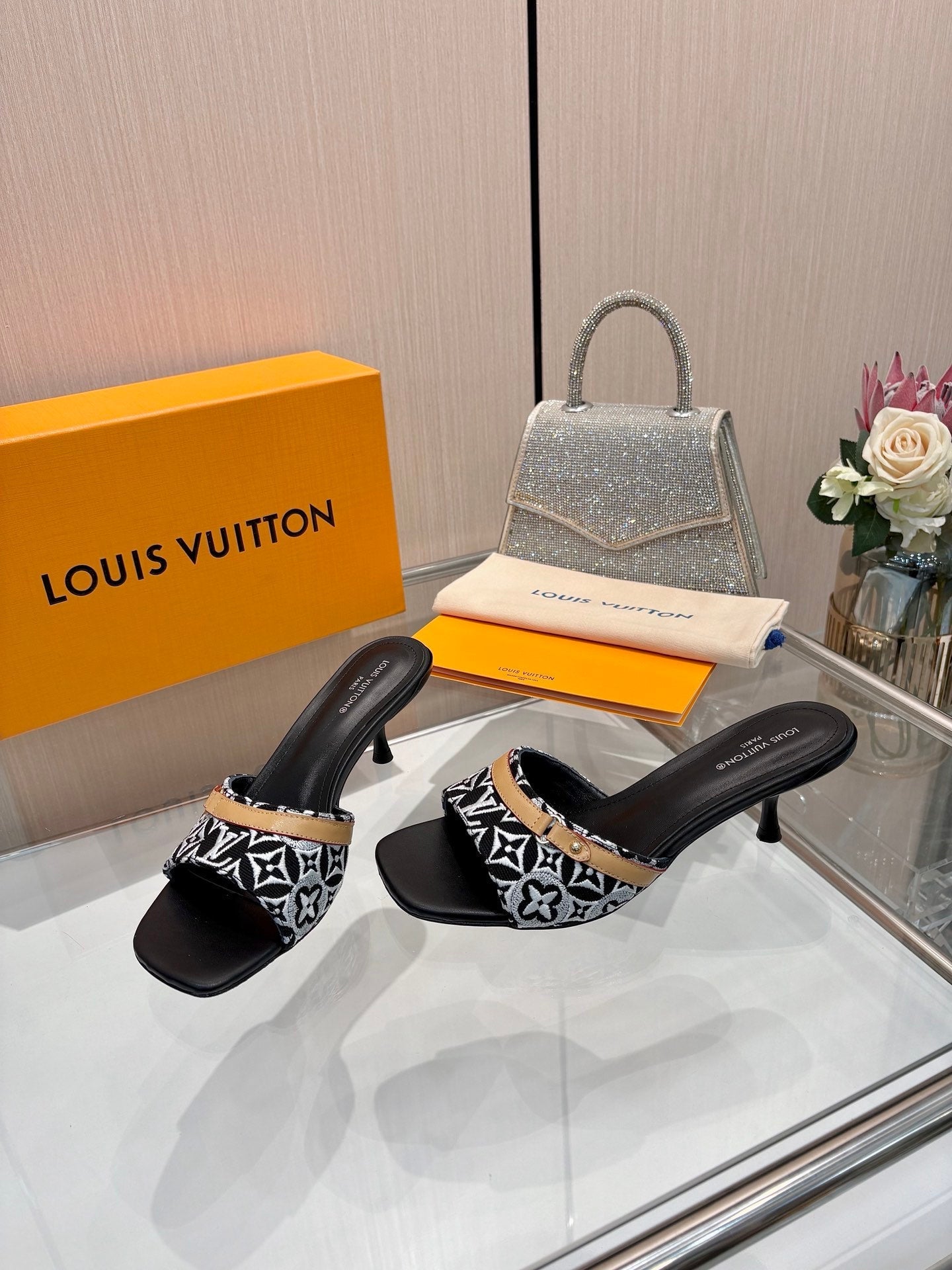 LV 26S HIGH-HEELED MULES 55 MM IN BLACK AND WHITE EMBROIDERED MONOGRAM CANVAS