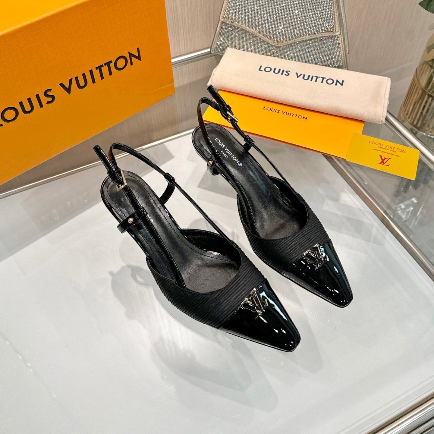 LV 26S SLINGBACK PUMPS 55 MM IN BLACK FABRIC AND CALFSKIN