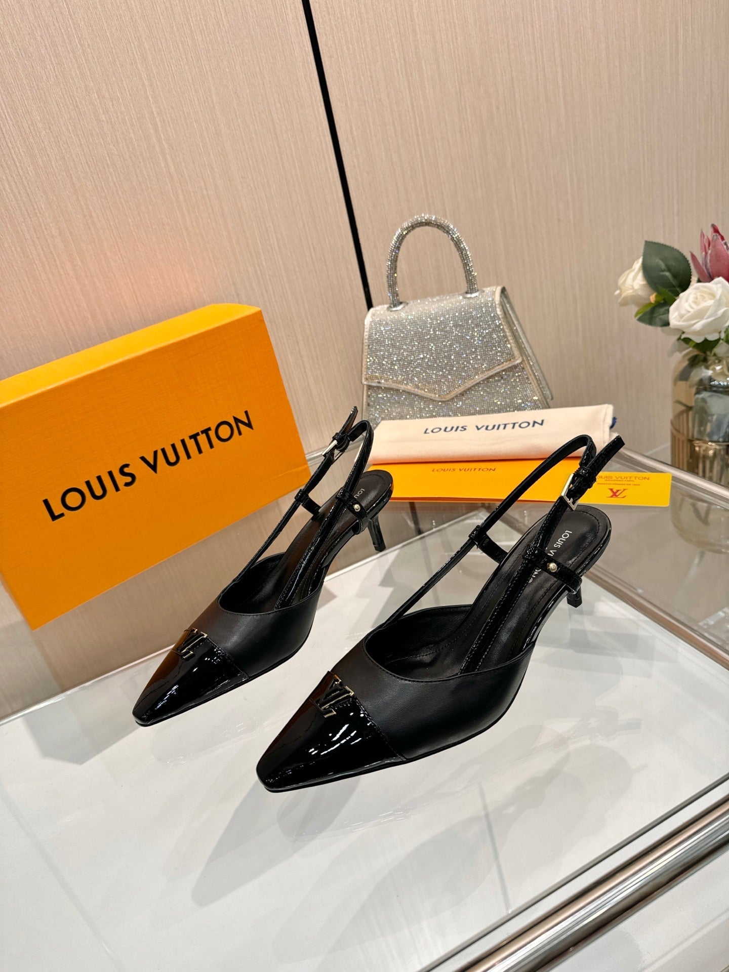 LV 26S SLINGBACK PUMPS 55 MM IN BLACK CALFSKIN