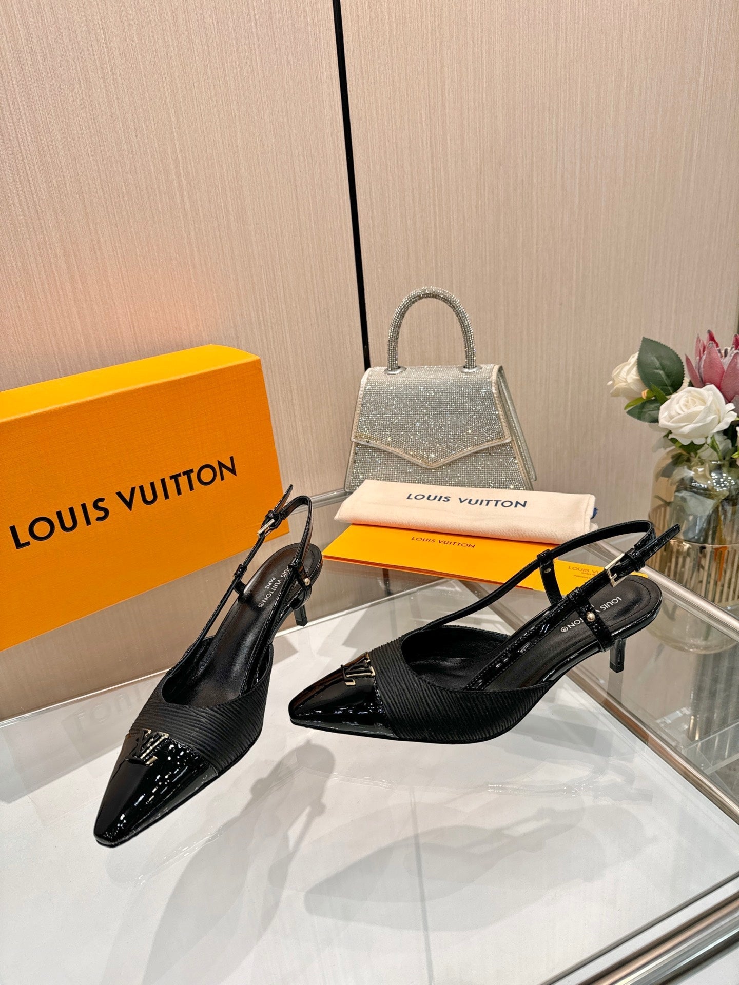 LV 26S SLINGBACK PUMPS 55 MM IN BLACK FABRIC AND CALFSKIN