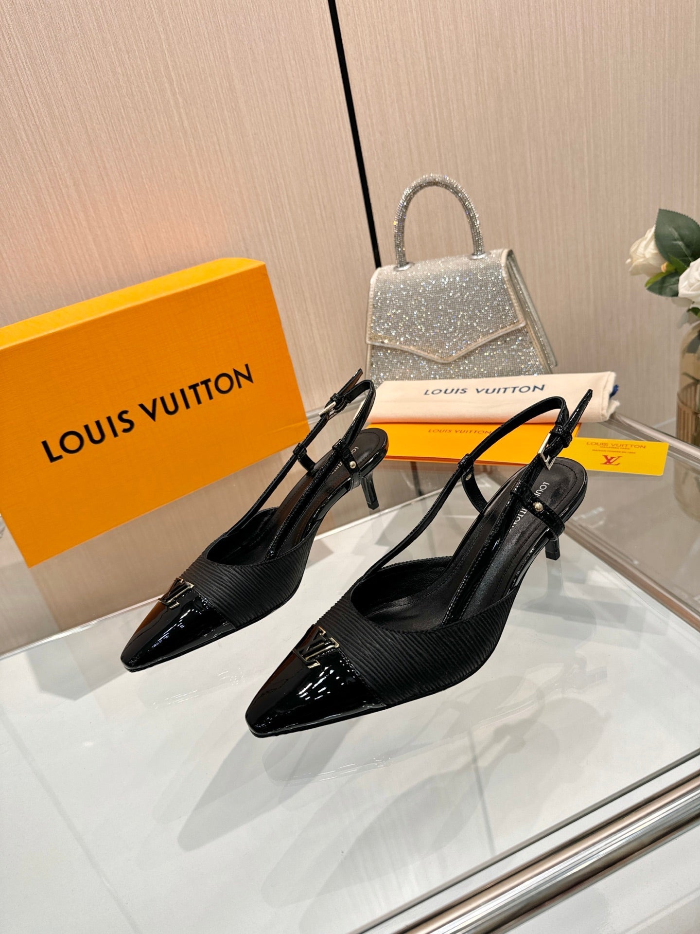 LV 26S SLINGBACK PUMPS 55 MM IN BLACK FABRIC AND CALFSKIN