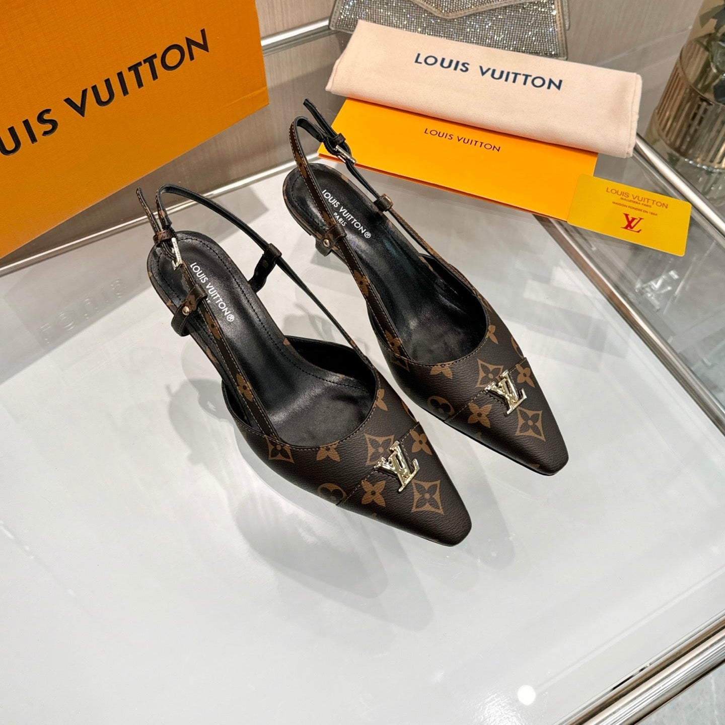 LV 26S SLINGBACK PUMPS 55 MM IN DARK BROWN COATED CANVAS
