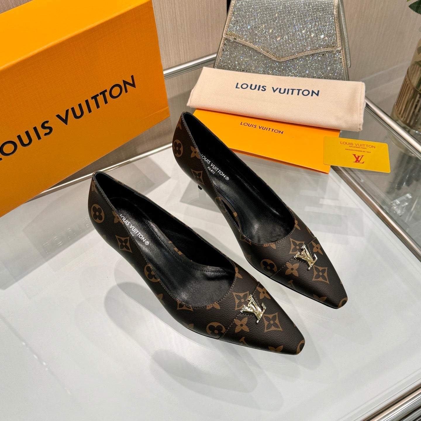 LV 26S POINTED-TOE HIGH HEELS 55 MM IN DARK BROWN COATED CANVAS