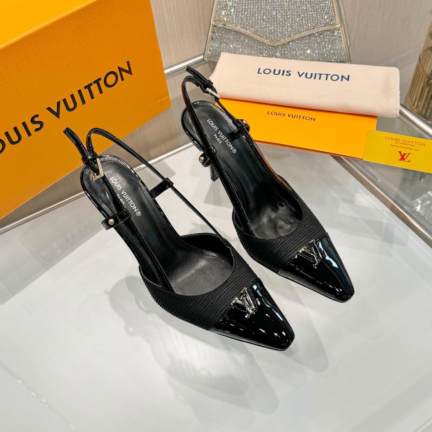 LV 26S SLINGBACK PUMPS 90 MM IN BLACK FABRIC AND CALFSKIN