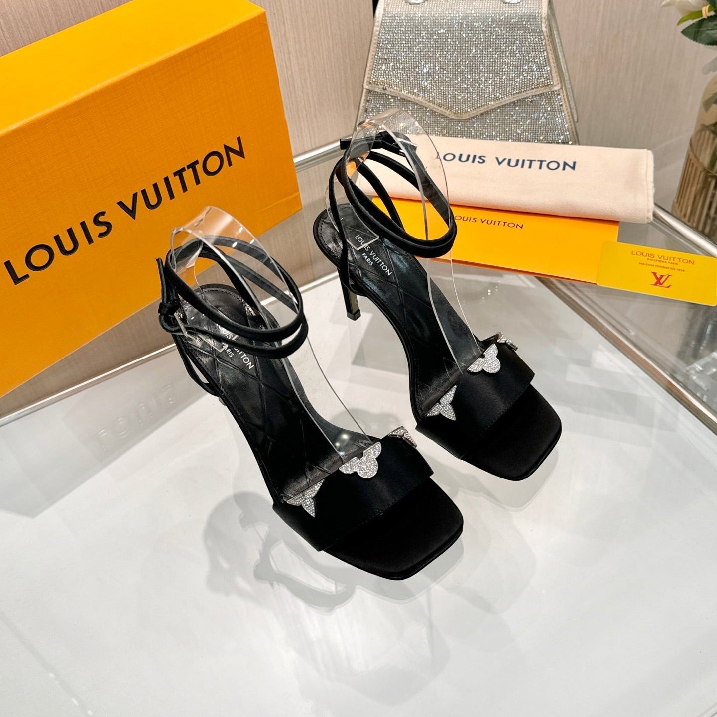 LV 26S HIGH-HEELED SANDALS 90 MM IN BLACK SATIN