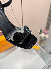 LV 26S HIGH-HEELED SANDALS 90 MM IN BLACK GLOSSY CALFSKIN