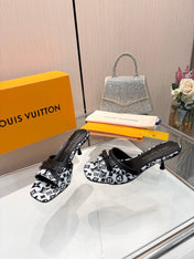 LV 26S HIGH-HEELED MULES 55 MM IN WHITE AND BLACK MONOGRAM CANVAS STYLE 2